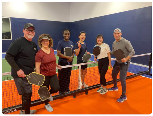 Linda Conrad helping pickleball players improve their skills