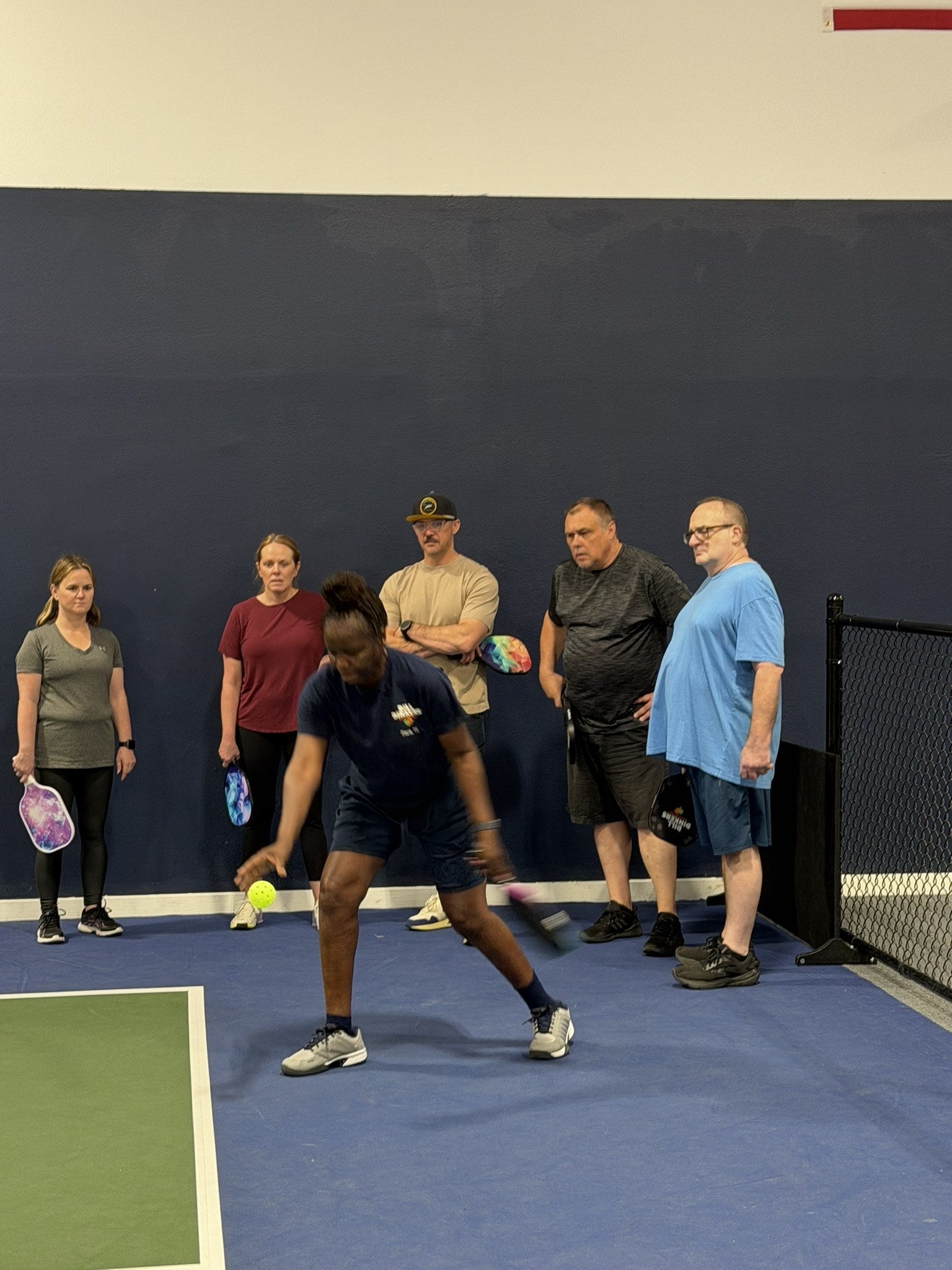 Linda Conrad coaching pickleball players
